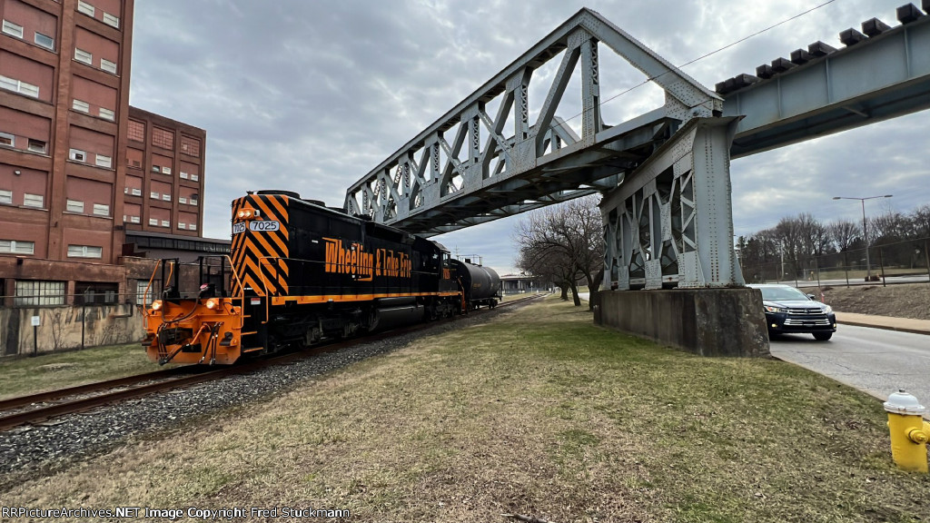 WE 7025 comes out from under the abandoned A&BB RR bridge.